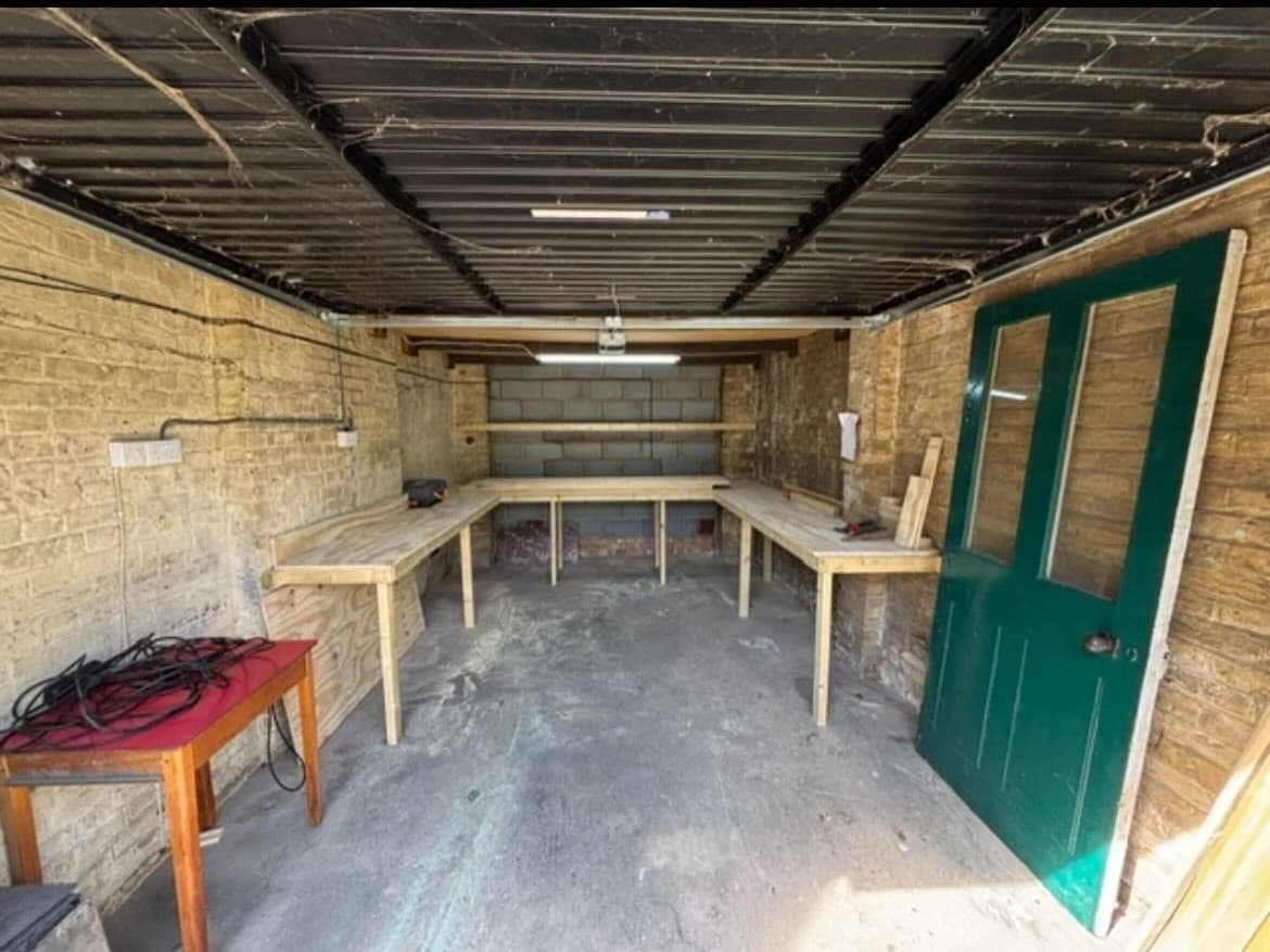 Garage in Bromley after clearance, empty with clear floor space